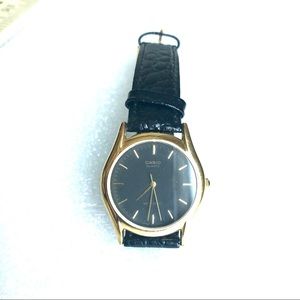 Casio women watch black leather strap gold rim